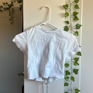 White cropped top with crossing chains down the back